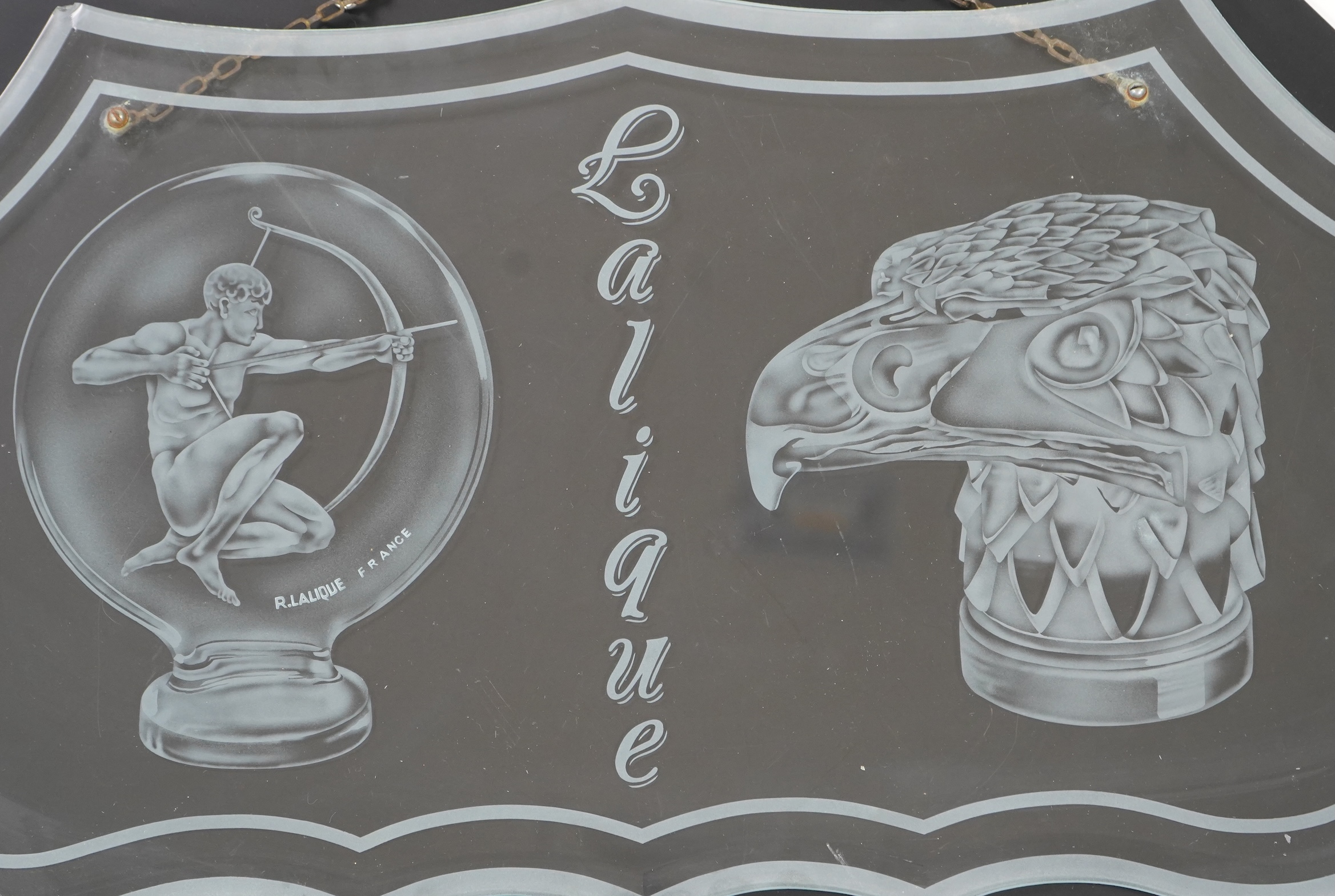 A rare boutique advertising hanging glass sign for Lalique